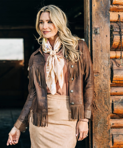 lea-leather-fringe-jacket-front-on-model-with-scarf_2048x.webp